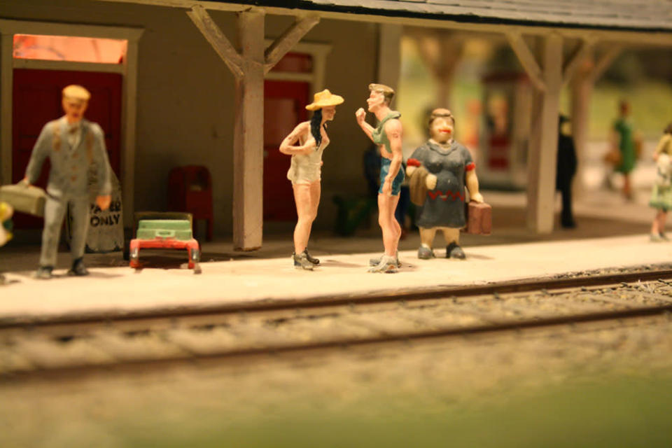 A miniature couple engages in an argument while waiting for a train. After 67 years in the Liberty Village location, The Model Railroad Club of Toronto will be moving to make way for a condo.