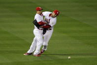 ST LOUIS, MO - OCTOBER 27: Matt Holliday #7 and Rafael Furcal #15 of the St. Louis Cardinals collide after Holliday makes an error on a ball hit by Nelson Cruz #17 of the Texas Rangers in the fourth inning during Game Six of the MLB World Series at Busch Stadium on October 27, 2011 in St Louis, Missouri. (Photo by Doug Pensinger/Getty Images)