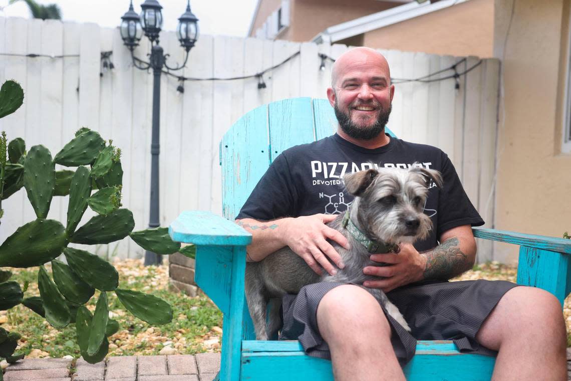 Jameson O’Hanlon, who had an abortion when he identified as female, with his dog, Scully. O’Hanlon said he was grateful to have had the choice to decide but is worried about what is to come after the Supreme Court’s decision to overturn Roe v. Wade.