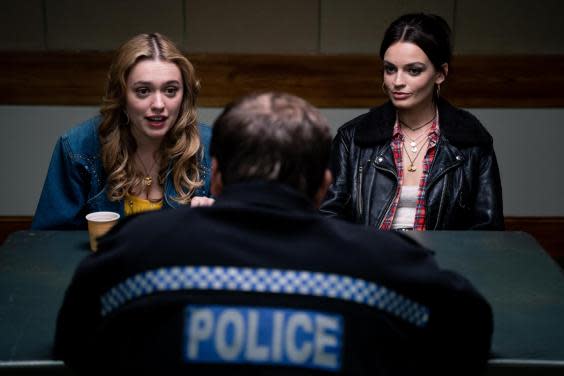 Aimee (Aimee Lou Wood) and Maeve (Emma Mackey) report a sexual assault to the police in ‘Sex Education’ (Netflix)