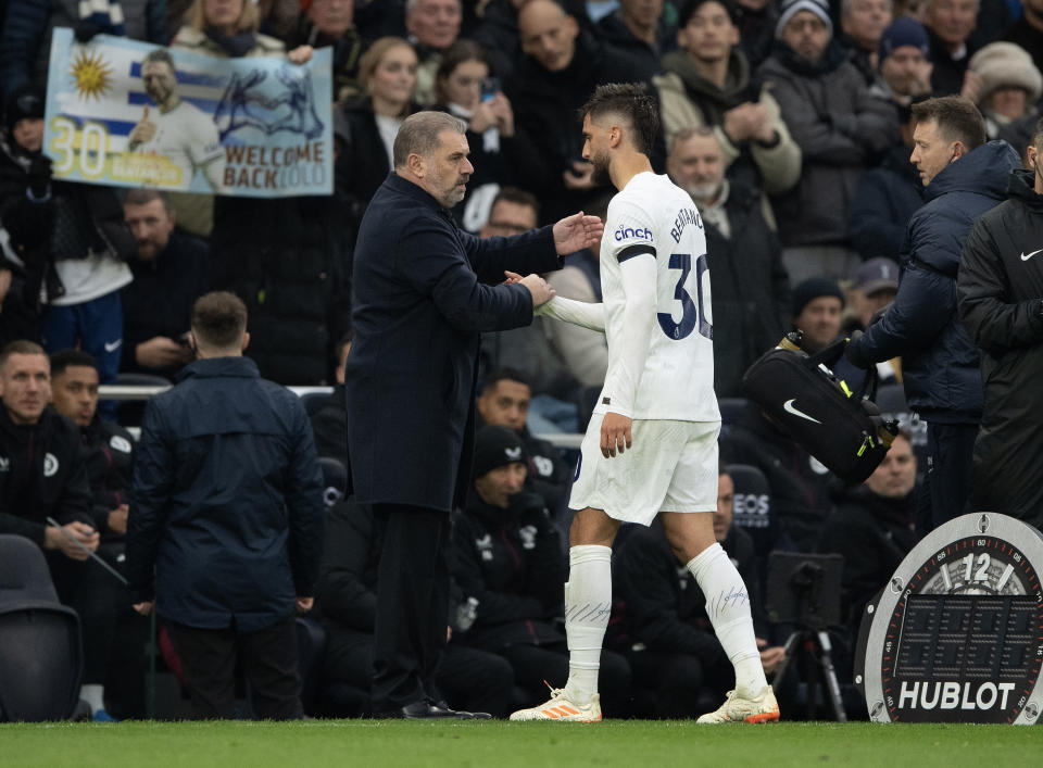 LONDON, ENGLAND - NOVEMBER 26:  Rodrigo Bentancur of Tottenham Hotspur walks from the pitch to the waiting Tottenham manager Ange Postecoglou after picking up an injury during the Premier League match between Tottenham Hotspur and Aston Villa at Tottenham Hotspur Stadium on November 26, 2023 in London, England. (Photo by Visionhaus/Getty Images)