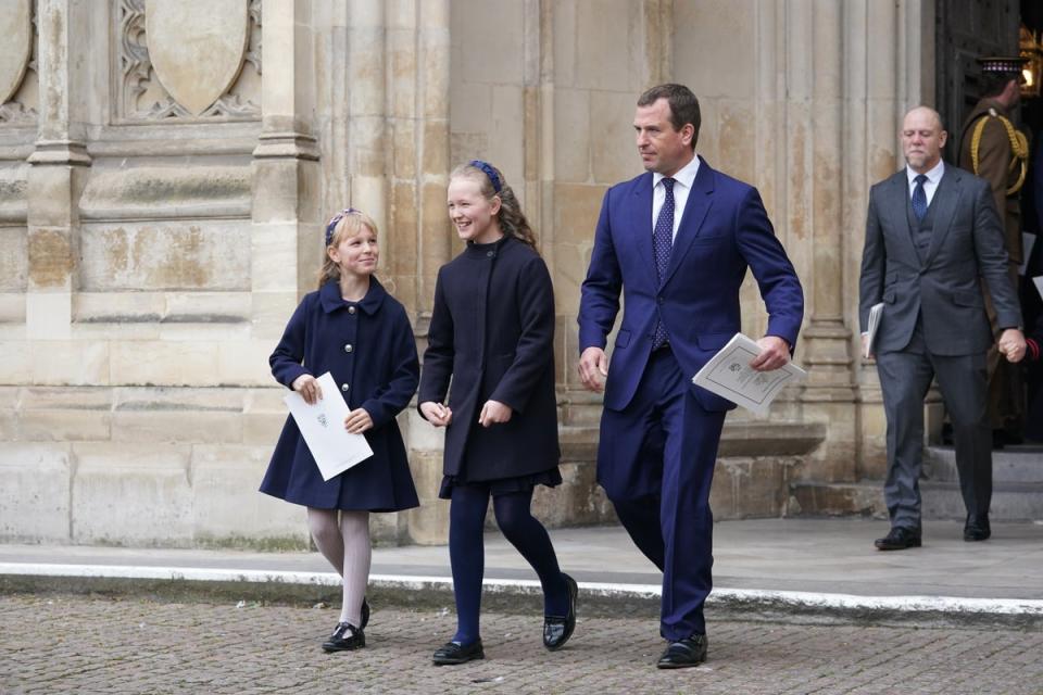 Peter Phillips with Isla Phillips and Savannah Phillips (centre) leaving the abbey (Kirsty O’Connor/PA)