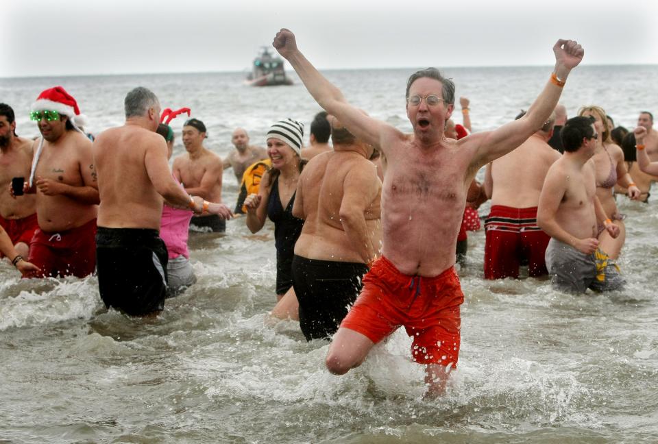 New York's Coney Island Polar Bear Club Takes The Icy Plunge On New Years