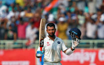 India v England - Second Test cricket match - Dr. Y.S. Rajasekhara Reddy ACA-VDCA Cricket Stadium, Visakhapatnam, India - 17/11/16 - India's Cheteshwar Pujara celebrates after scoring his century. REUTERS/Danish Siddiqui