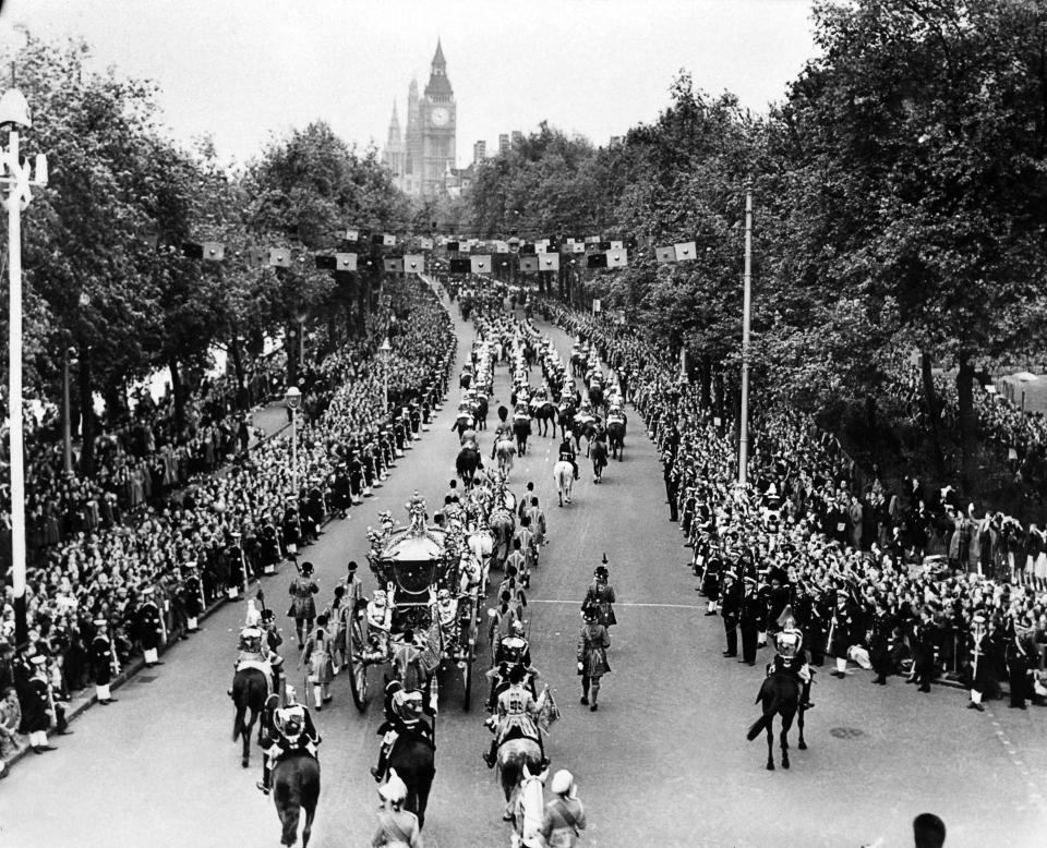 In this file photo taken on June 2, 1953, the royal carriage of Queen Elizabeth II passes along Victoria Embankment on its way to Westminster Abbey, during the ceremony of coronation of the Queen. She was crowned at Westminster Abbey in London, and served until her death in 2022 at age 96.