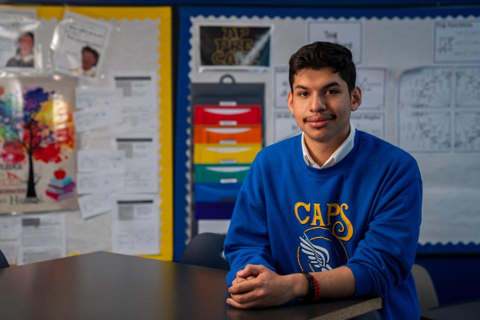 Angel Ulloa, 18, poses for a photo at College Achieve Central Charter School in North Plainfield, N.J.