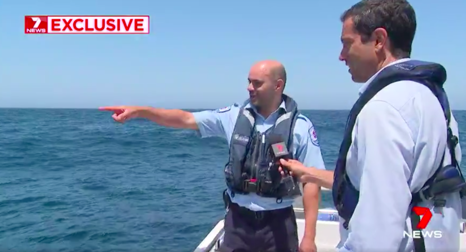 Mr Polidano spotted a shark swimming perilously close to the men. Source: 7News