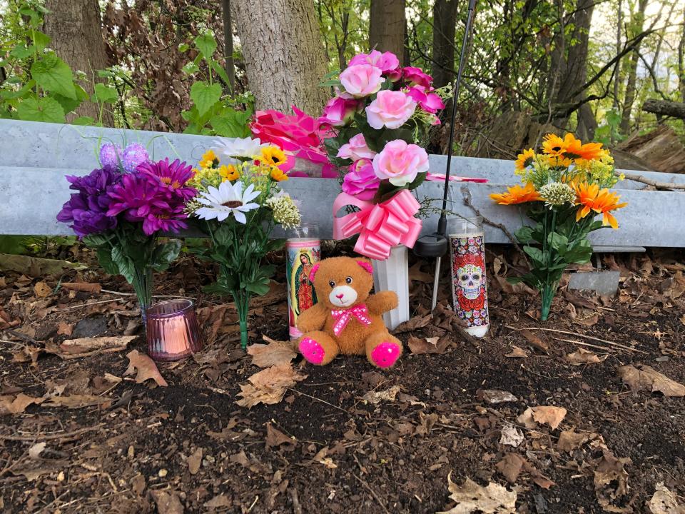 As seen on May 3, 2023, flowers and other items have been left along the side of Route 611/Park Avenue in Stroudsburg, near where the remains of Dana Smithers were found 11 months after her disappearance.