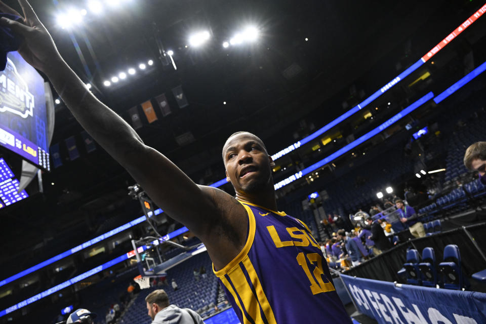 LSU forward KJ Williams gestures to fans after an NCAA college basketball game against Georgia in the first round of the Southeastern Conference tournament, Wednesday, March 8, 2023, in Nashville, Tenn. LSU won 72-67. (AP Photo/John Amis)