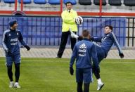 Argentina's national soccer team players Lionel Messi (R), Javier Mascherano (L) and Nicolas Otamendi participate in a team training session in Concepcion, Chile, July 1, 2015. Argentina will face Chile for their Copa America finals on July 4. REUTERS/Andres Stapff