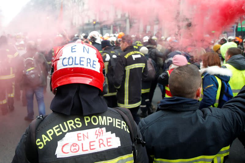 French firefighters demonstrate during a national protest in Paris