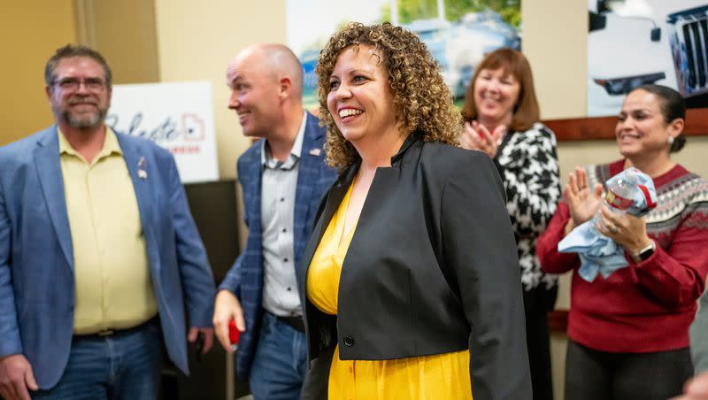 Celeste Maloy reacts after the election was called in her favor, with Gov. Spencer Cox, second from left, supporting her at the Utah Trucking Association headquarters in West Valley City on Tuesday, Nov. 21, 2023. Maloy ran against Democratic state Sen. Kathleen Riebe, D-Cottonwood Heights, in the special election to fill Rep. Chris Stewart’s seat in the 2nd Congressional District.