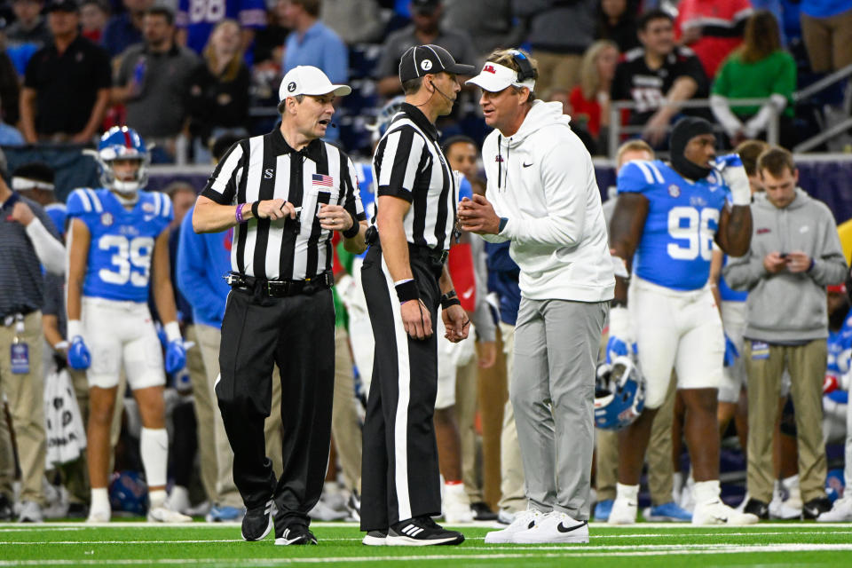 HOUSTON, TX - DECEMBER 28: Mississippi Rebels head coach Lane Kiffin pleads his case with the officials after Ole Miss was flagged for it&#39;s second targeting penalty of the game during the TaxAct Texas Bowl between the Texas Tech Red Raiders and Ole Miss Rebels at NRG Stadium on December 28, 2022 in Houston, Texas. (Photo by Ken Murray/Icon Sportswire via Getty Images)