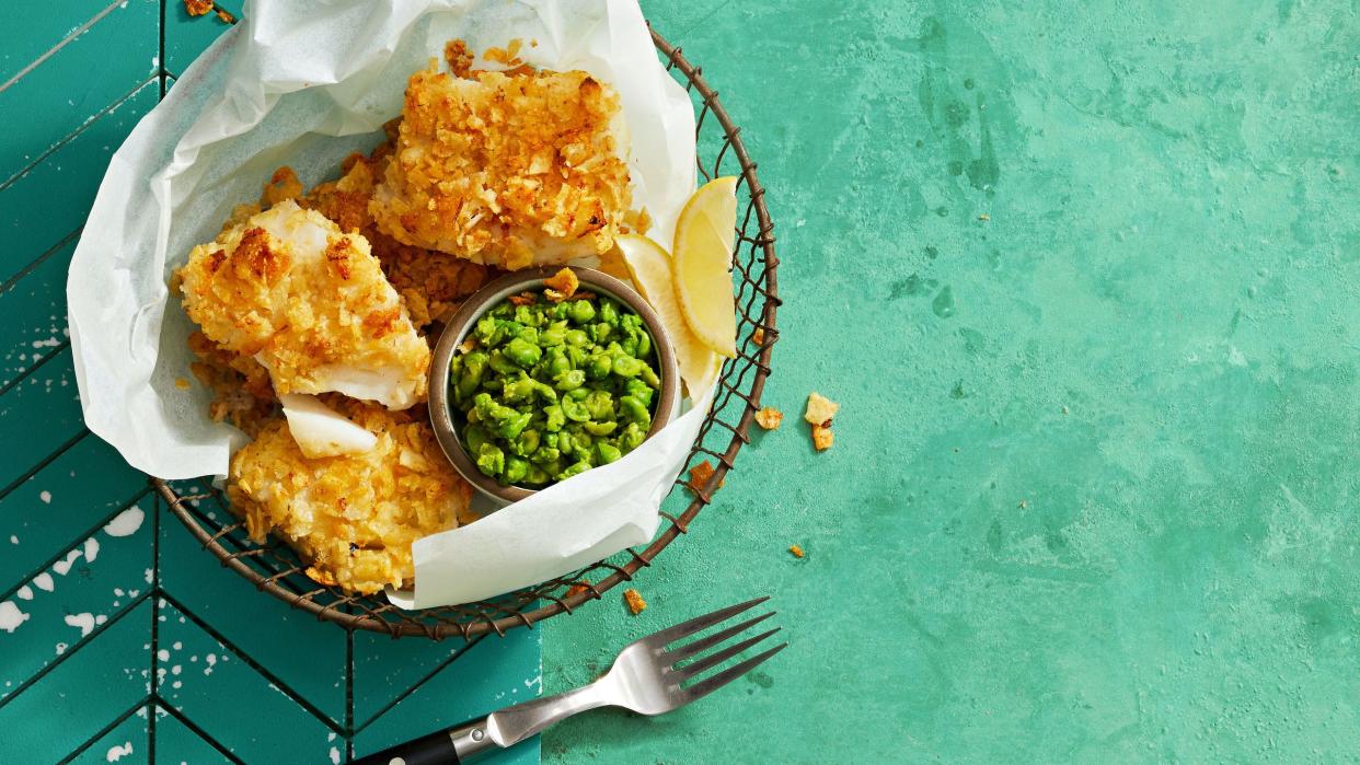 fish and chips in a wire basket