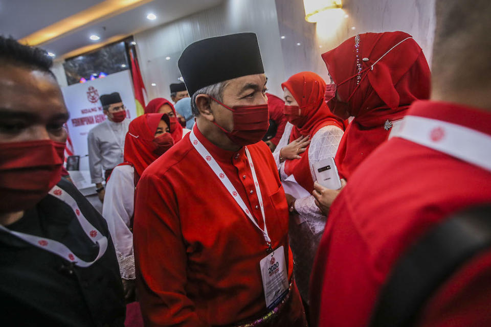 Umno president Datuk Seri Ahmad Zahid Hamidi (centre) said parties within a coalition can have different opinions, principles and philosophy, yet can also work towards bettering the nation. ― Picture by Hari Anggara