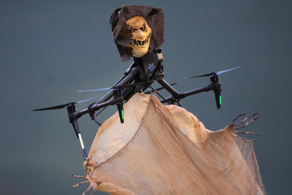A Halloween themed drone flies inside Chase Field before Game 4 of the 2023 World Series between the Texas Rangers and the Arizona Diamondbacks in Phoenix on October 31, 2023. The DBacks lost to the Rangers 11-7, putting the Ranger at 3-1 in the World Series.