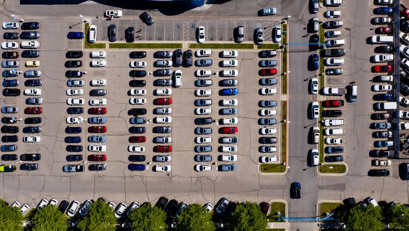 Cars fill the lots at the Ken Garff Honda Downtown dealership in Salt Lake City on May 13, 2021.