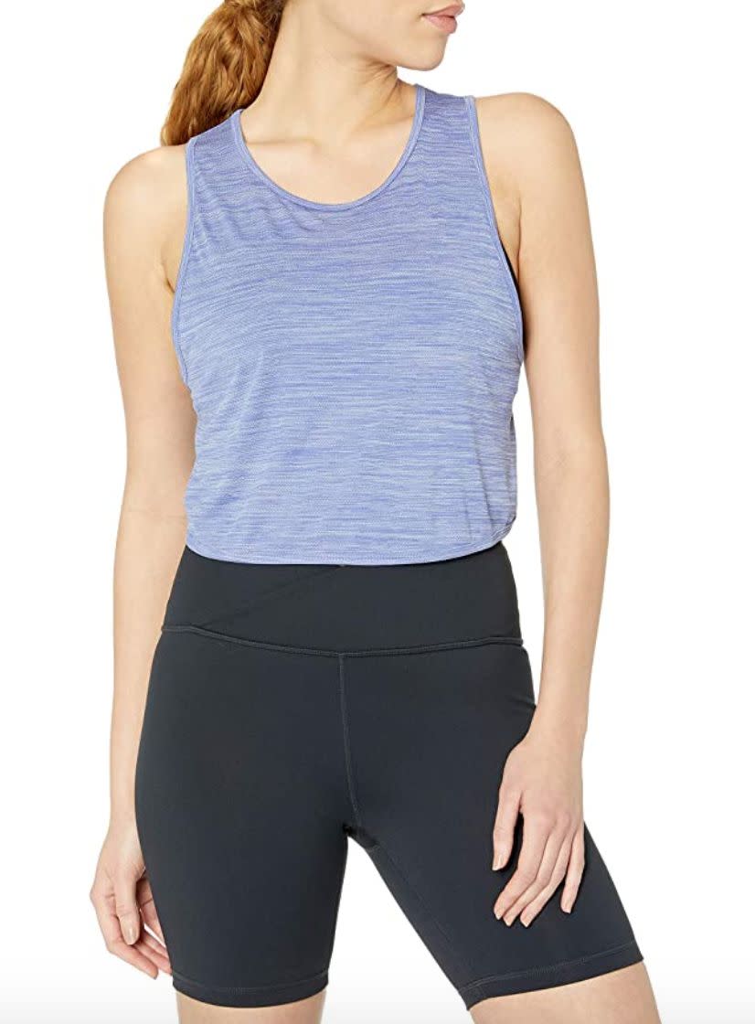 For fans of crop tops, you might snag this <a href="https://amzn.to/3ahAbFk" target="_blank" rel="noopener noreferrer">tank</a> from Amazon's <a href="https://amzn.to/3fRB8W3" target="_blank" rel="noopener noreferrer">in-house brand Core10</a>. It has a peekaboo back so you can show off your sports bra. And it features a mesh moisture-wicking design. <br /><br /><strong>Sizes:</strong> This tank comes in sizes XS to 3X. <br /><strong>Rating:</strong> It has a 4.4-star rating over more than 300 reviews. <br /><strong>$$$:</strong> <a href="https://amzn.to/3iBkGLC" target="_blank" rel="noopener noreferrer">Find it starting at $12 on Amazon</a>.