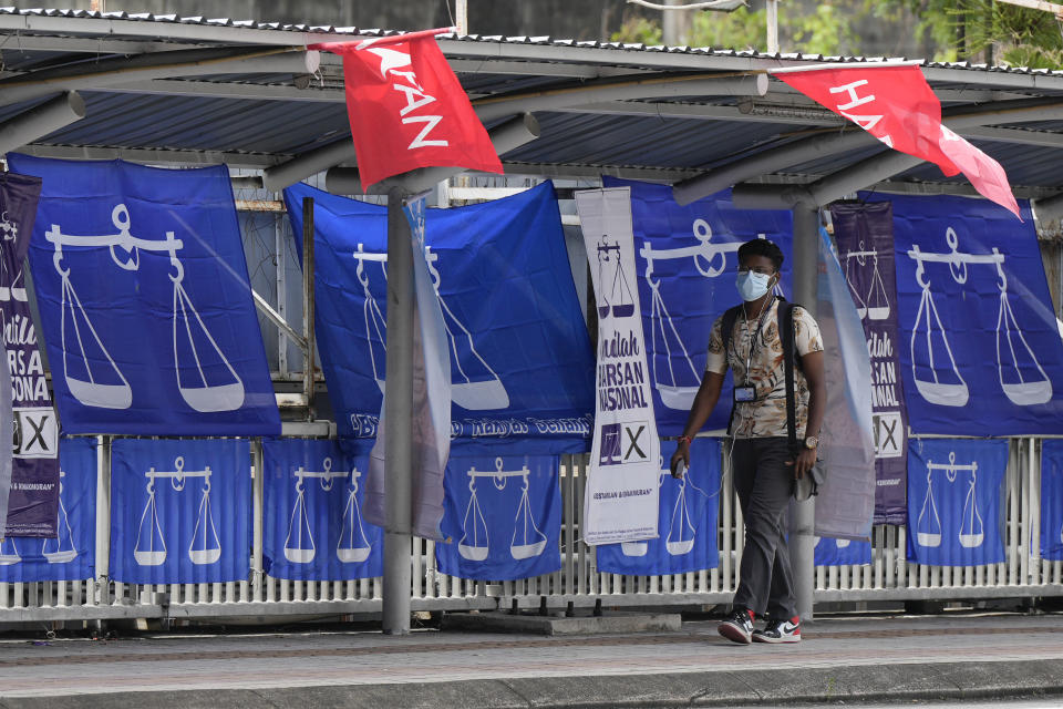 Flags of Malaysia's ruling National Front coalition, or Barisan Nasional, are displayed in Kuala Lumpur, Malaysia, Thursday, Nov. 17, 2022. Malaysia's general elections will take place Saturday, over a month after Prime Minister Ismail Sabri Yaakob dissolved Parliament and announced snap elections. The country's longest-serving coalition is seeking to regain its dominance after a shocking loss in 2018, but political reformers are aiming for a second surprise win. (AP Photo/Vincent Thian)