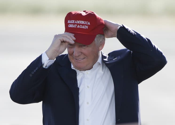 Trump wearing his signature headwear. (Photo: AP Images)