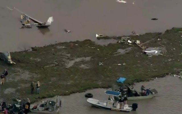 A Boeing 767 cargo jetliner with three people on board crashed into a bay near Houston’s George Bush Intercontinental Airport