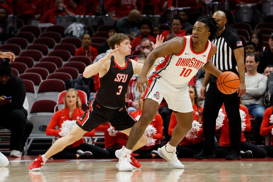 Ohio State's Brice Sensabaugh, right, posts up against Saint Francis' Luke Ruggery. Sensabaugh had a game-high 15 points.