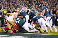 Philadelphia Eagles quarterback Jalen Hurts (1) scores during the second half of the NFC Championship NFL football game between the Philadelphia Eagles and the San Francisco 49ers on Sunday, Jan. 29, 2023, in Philadelphia. (AP Photo/Matt Rourke)