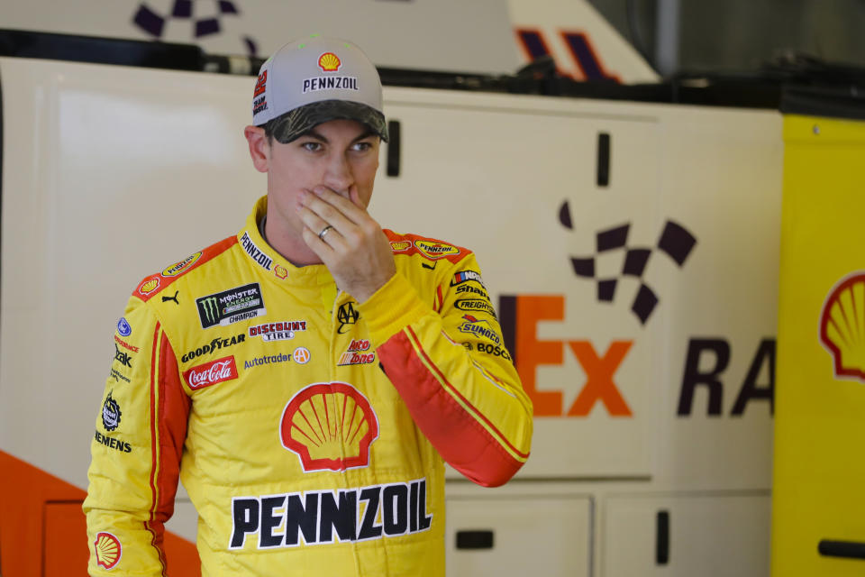 NASCAR driver Joey Logano walks out of his garage after he qualified for the NASCAR Brickyard 400 auto race at the Indianapolis Motor Speedway, Sunday, Sept. 8, 2019 in Indianapolis. (AP Photo/Darron Cummings)