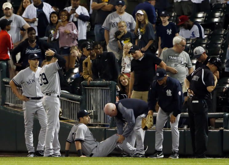 Dustin Fowler was carted off the field in his major-league debut. (AP Photo)