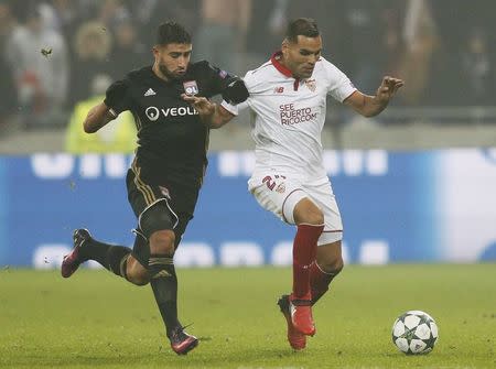 Football Soccer - Olympique Lyon v Sevilla - UEFA Champions League Group Stage - Group stage - Stade de Lyon - Decines, France - 7/12/16. Olympique Lyon's Nabil Fekir in action with Sevilla's Gabriel Mercado. REUTERS/Robert Pratta