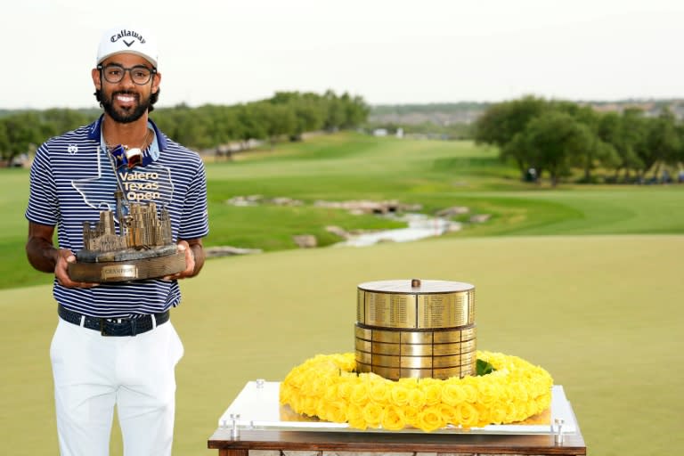 SAN ANTONIO, TEXAS - APRIL 07: Akshay Bhatia of the United States poses with the trophy after winning the Valero Texas Open on the 18th hole of the first playoff during the final round of the Valero Texas Open at TPC San Antonio on April 07, 2024 in San Antonio, Texas. Raj Mehta/Getty Images/AFP (Raj Mehta)