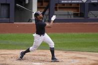 New York Yankees Aaron Hicks watches his hit during a workout Wednesday, March 31, 2021, at Yankee Stadium in New York. (AP Photo/Kathy Willens)