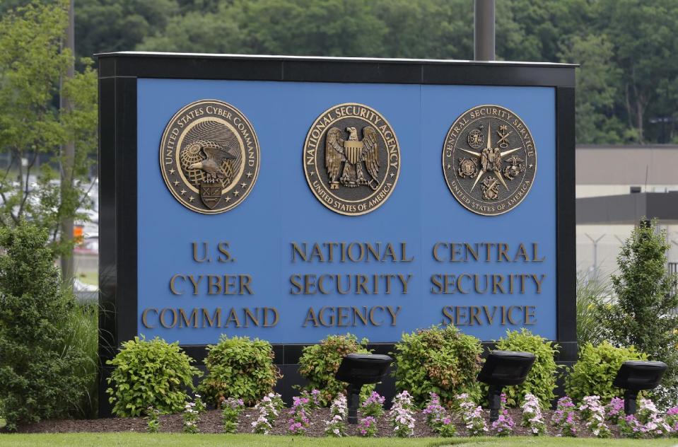 FILE - This June 6, 2013 file photo shows the sign outside the National Security Agency (NSA) campus in Fort Meade, Md. Compared with their more moderate Republican or Democratic peers, tea party supporters and liberals are significantly more likely to oppose the collection of millions of ordinary citizens’ telephone and Internet data, an Associated Press-GfK poll shows. By a 2-to-1 margin, both tea party supporters and liberals say the government should put protecting citizens’ rights and freedoms ahead of protecting them from terrorists. (AP Photo/Patrick Semansky, File)