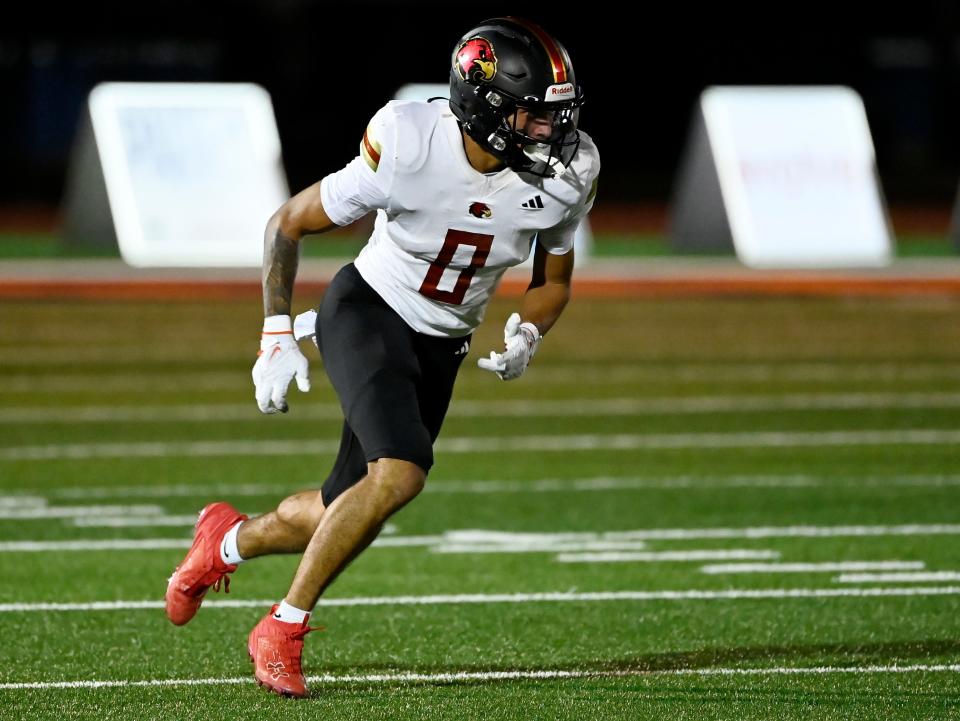 Ravenwood wide receiver Donovan Starr (0) runs a rout against Summit during an high school football game Thursday, October 3, 2024, in Spring Hill, Tenn.