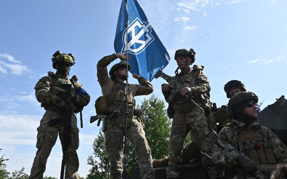 Fighters of the Russian Volunteer Corps - SERGEY BOBOK/AFP via Getty Images