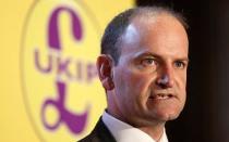 Ukip in open civil war as Nigel Farage calls for Douglas Carswell to be thrown out after knighthood row