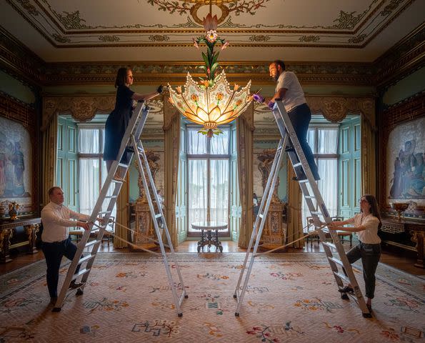 <p>Royal Collection Enterprises Limited 2024 | Royal Collection Trust</p> The Centre Room at Buckingham Palace, which leads to the famous balcony