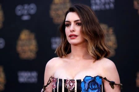 Cast member Anne Hathaway poses at the premiere of "Alice Through the Looking Glass" at El Capitan theatre in Hollywood, U.S., May 23, 2016. REUTERS/Mario Anzuoni