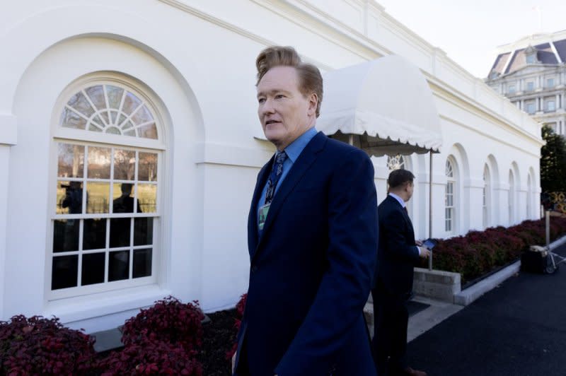 Comedian and television host Conan O'Brien walks outside the White House in Washington, D.C., on Friday. O'Brien earlier interviewed President Joe Biden for his "Conan O'Brien Needs a Friend" podcast. Photo by Michael Reynolds/UPI