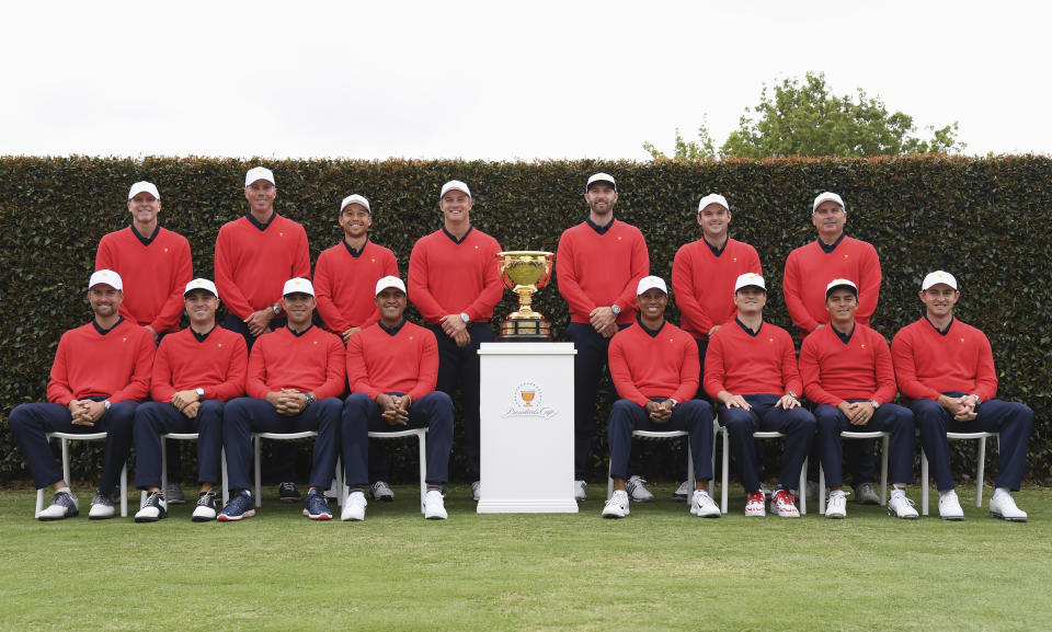 The USA team poses for a photo ahead of the President's Cup Golf tournament in Melbourne, Wednesday, Dec. 11, 2019. (AP Photo Andy Brownbill)