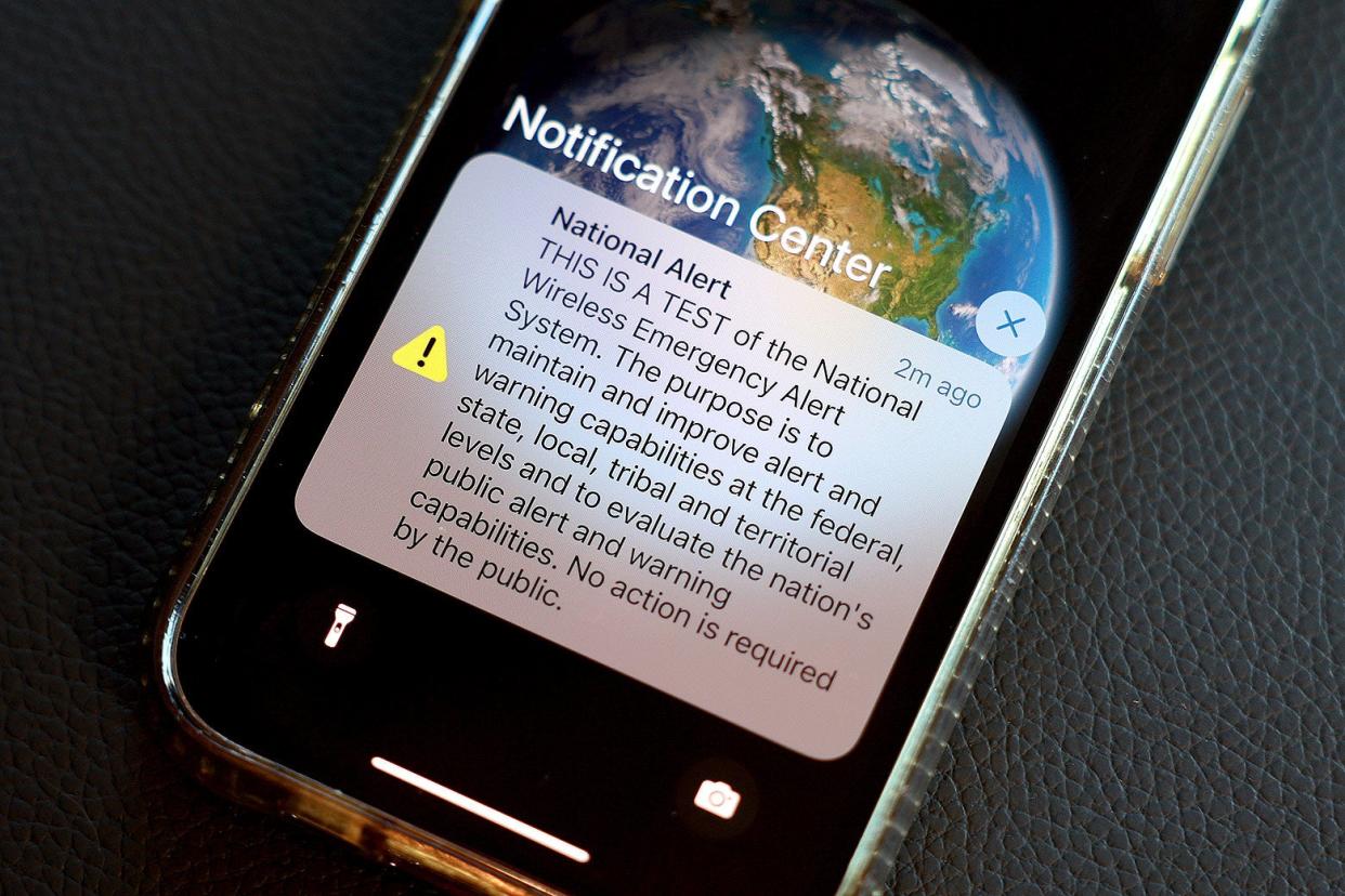 A national alert is displayed on a cellphone on Oct. 4.