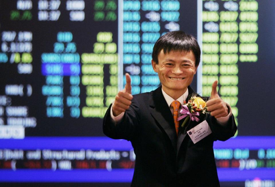 FILE - In this Nov. 6, 2007 file photo, Jack Ma, founder and CEO of Alibaba, celebrates at his company listing ceremony at the Hong Kong Stock Exchange. The mammoth IPO planned by e-commerce giant Alibaba Group highlights founder Ma’s improbable rise to China’s entrepreneur-in-chief. (AP Photo/Kin Cheung, File)