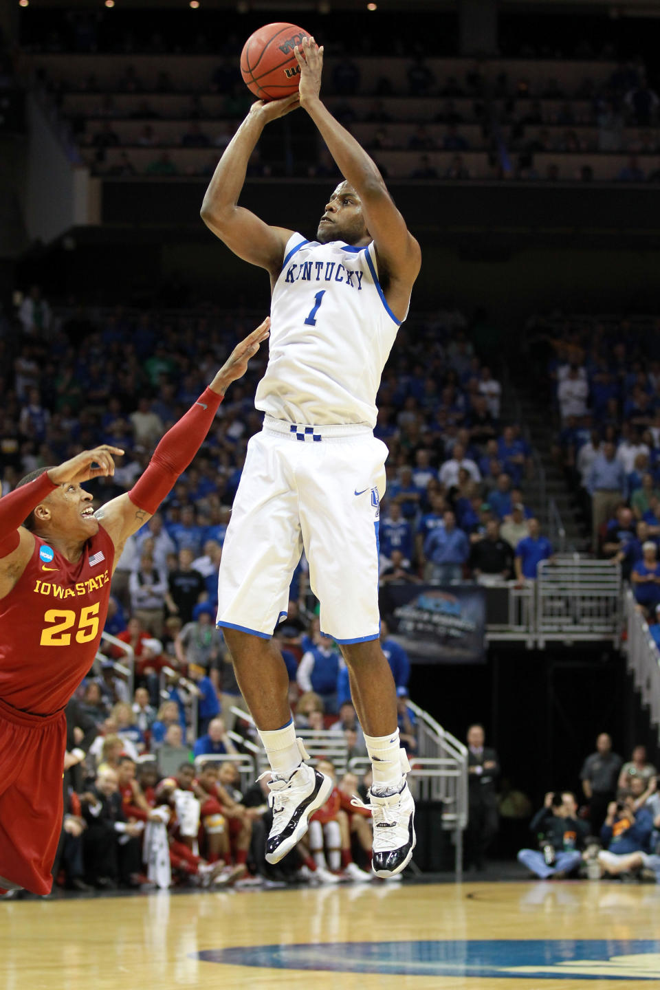 LOUISVILLE, KY - MARCH 17: Darius Miller #1 of the Kentucky Wildcats attempts a shot in the second half against Tyrus McGee #25 of the Iowa State Cyclones during the third round of the 2012 NCAA Men's Basketball Tournament at KFC YUM! Center on March 17, 2012 in Louisville, Kentucky. (Photo by Andy Lyons/Getty Images)