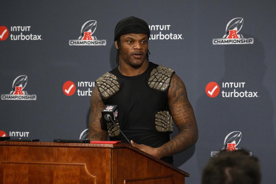 Baltimore Ravens quarterback Lamar Jackson (8) talks during a news conference after the AFC Championship NFL football game against the Kansas City Chiefs, Sunday, Jan. 28, 2024, in Baltimore. The Chiefs won 17-10. (AP Photo/Nick Wass)