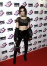 <p>PVC trousers and diamante – only for the brave, Charli [Photo: Getty/John Phillips] </p>
