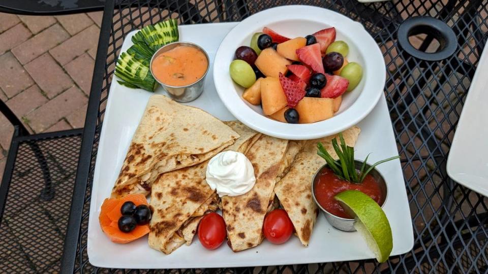 Chicken quesadilla and side of fruit at The Gasthaus in Lebanon