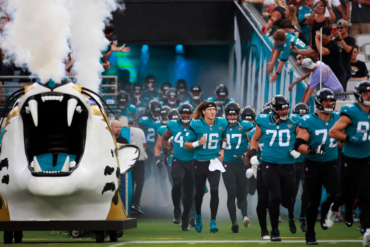 Jaguars quarterback Trevor Lawrence (16) leads the team out of a tunnel and onto TIAA Bank Field last week against the Cleveland Browns. The Jaguars will play their second preseason game at home on Saturday against the Pittsburgh Steelers.