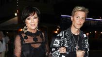 <p>Mother of the bride Kris Jenner — accompanied by Gui Siqueira — makes her grand entrance. </p>