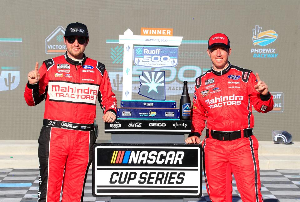 Mitchell&#39;s Chase Briscoe (left) and crew chief Johnny Klausmeier pose with the trophy after winning the NASCAR Cup Race in Phoenix three weeks ago.