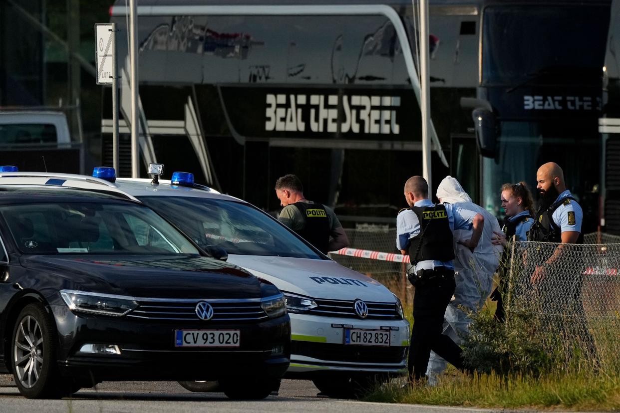 Police arrest a person, believed to be the suspect, at the scene of the Fields shopping center in Copenhagen, Denmark, on July 3, 2022 following a shooting. 